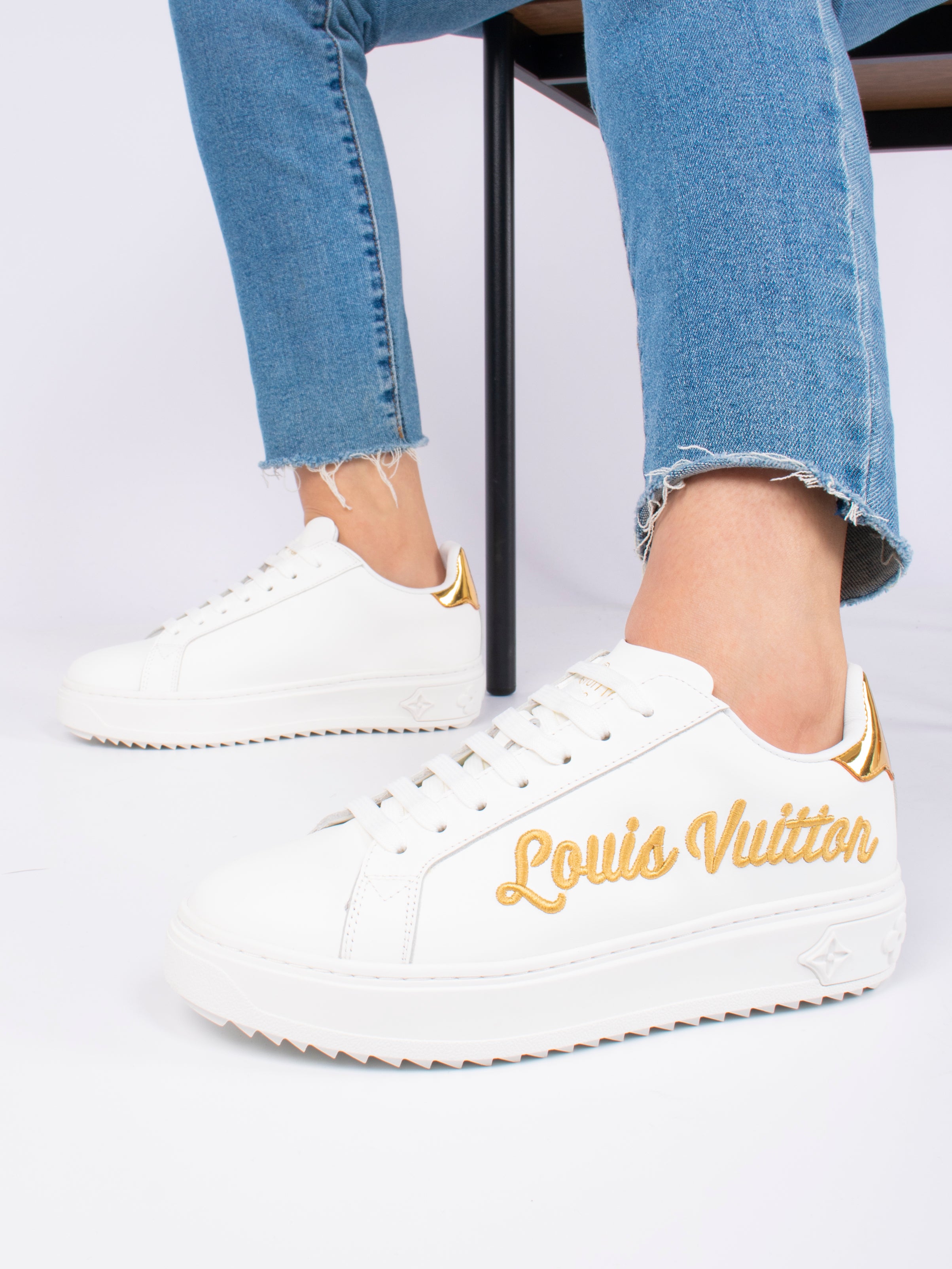 Louis Vuitton white / gold sneakers