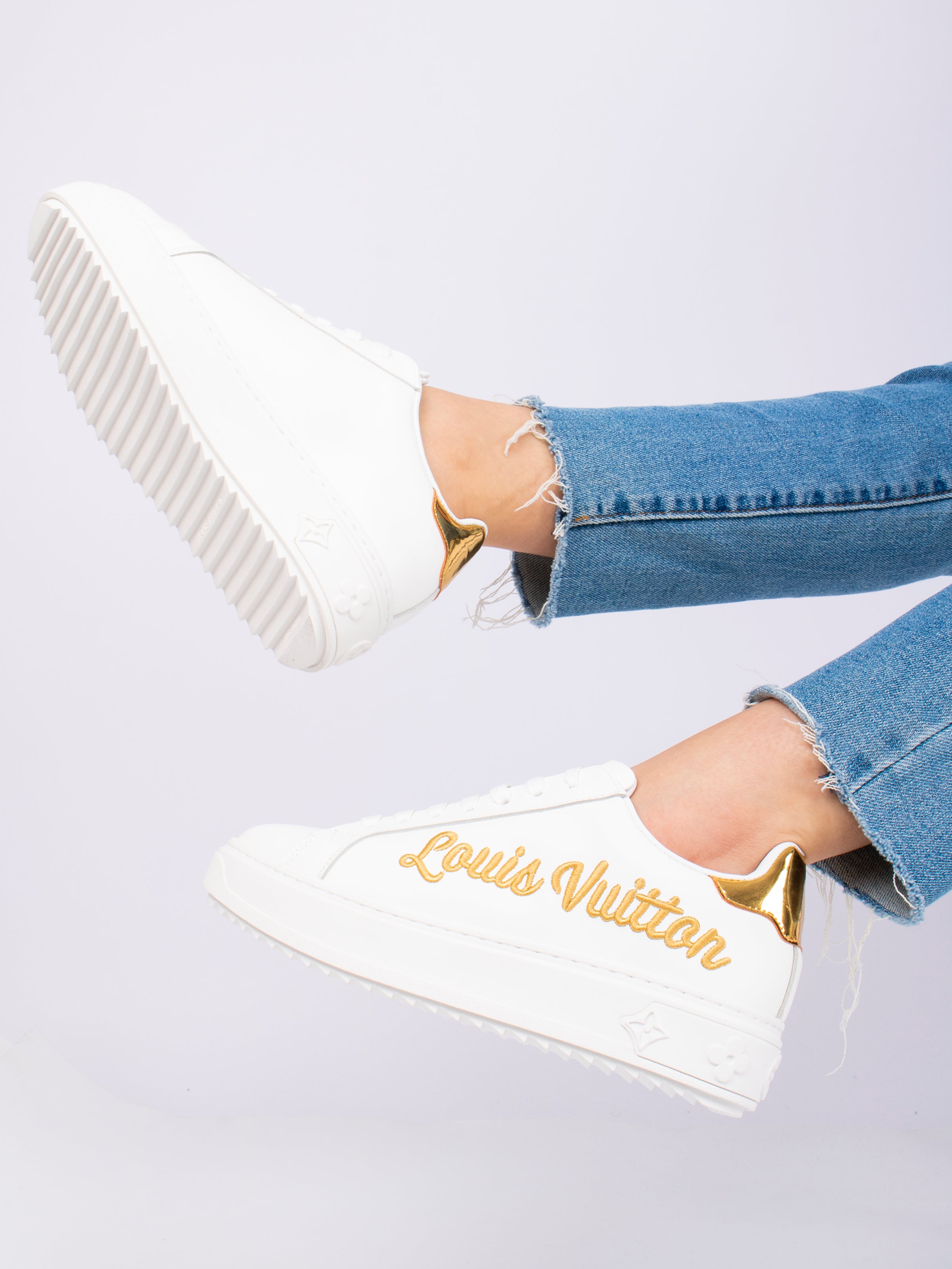 Louis Vuitton white / gold sneakers